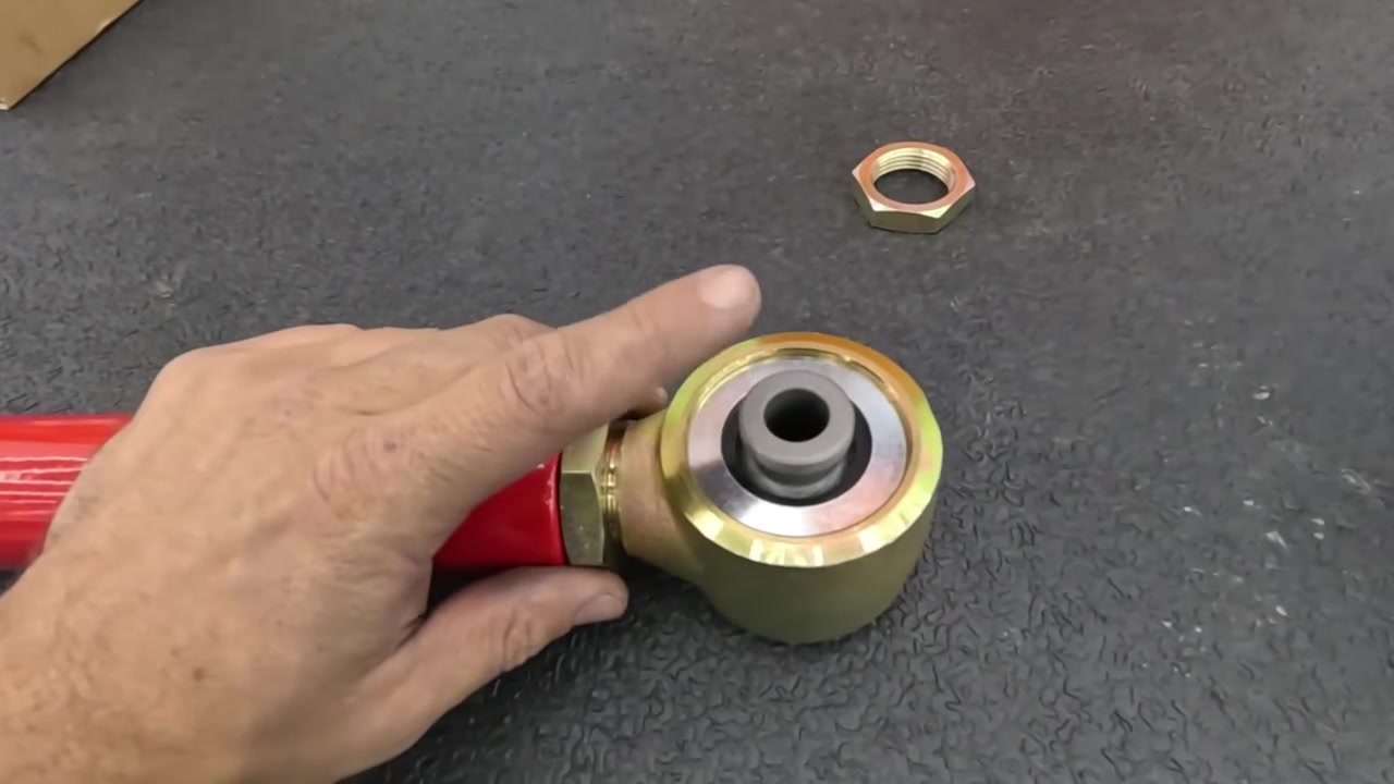 New red powder-coated Core 4x4 Crawl Series double-threaded long arm with Johnny Joints
