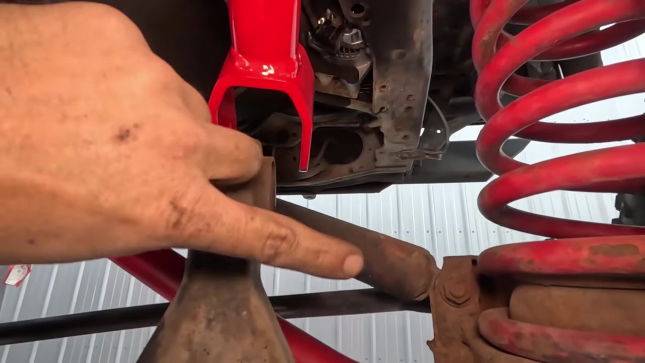 Spence pointing at worn axle bushing housing on Dana 30