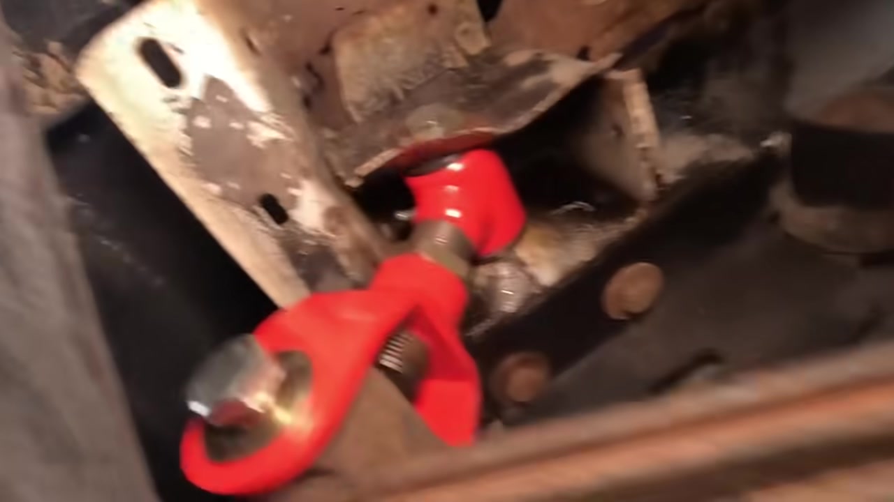Core 4x4 adjustable leaf spring shackle installed on Jeep Cherokee XJ