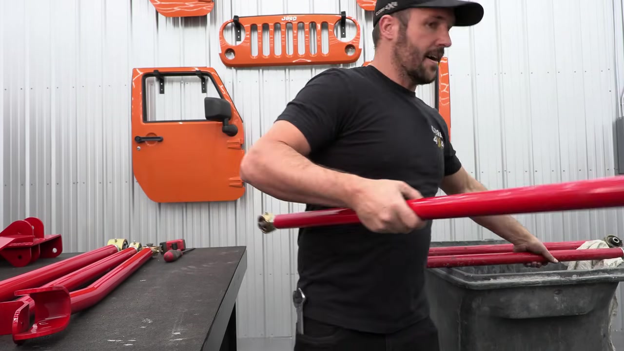 Comparing thread engagement between old Camp Series and new Crawl Series Johnny Joints on the ZJ control arms