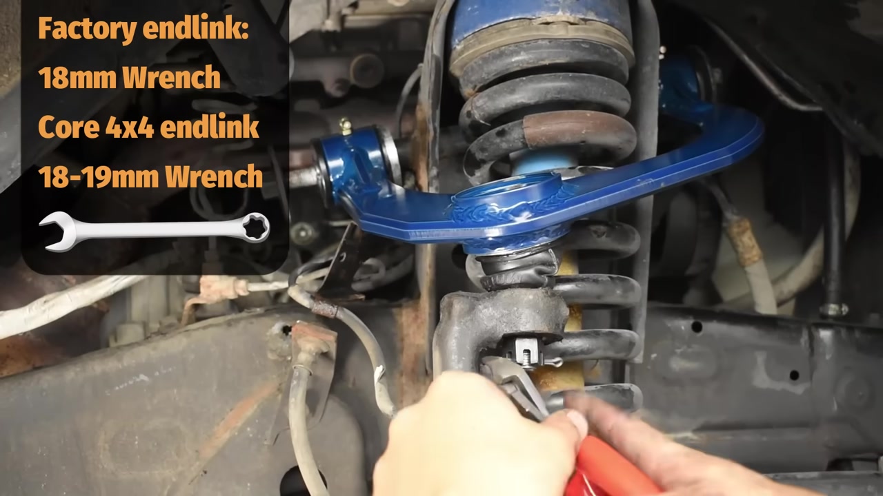 Torquing the CORE 4X4 upper control arm ball joint nut on a Toyota Tacoma with wrench size overlay showing 18-19mm
