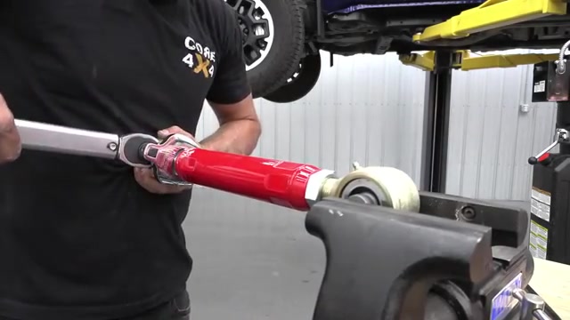 Comparison of the thin factory sway bar end link next to the heavy-duty Core 4x4 Johnny Joint end link for the 2024 Toyota Tacoma