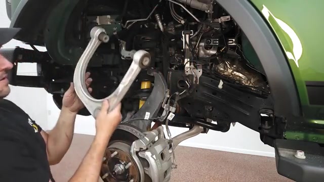 Removing the factory upper control arm from the 2022 Ford Bronco front suspension