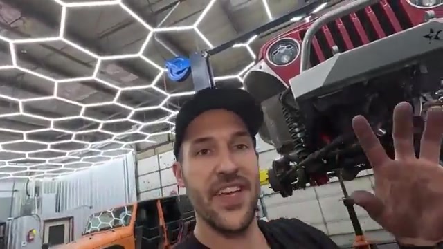 Spence wrapping up the front install on the LJ Wrangler in the Core 4x4 shop