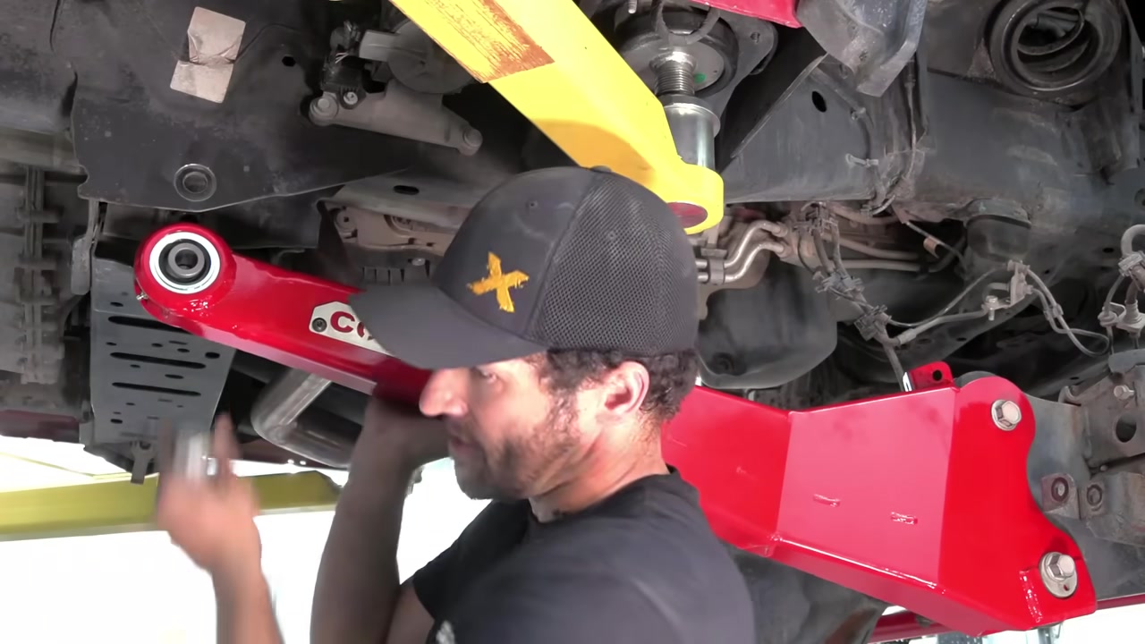 Installing the new Core 4x4 red boxed radius arm onto the Ram 2500 front axle