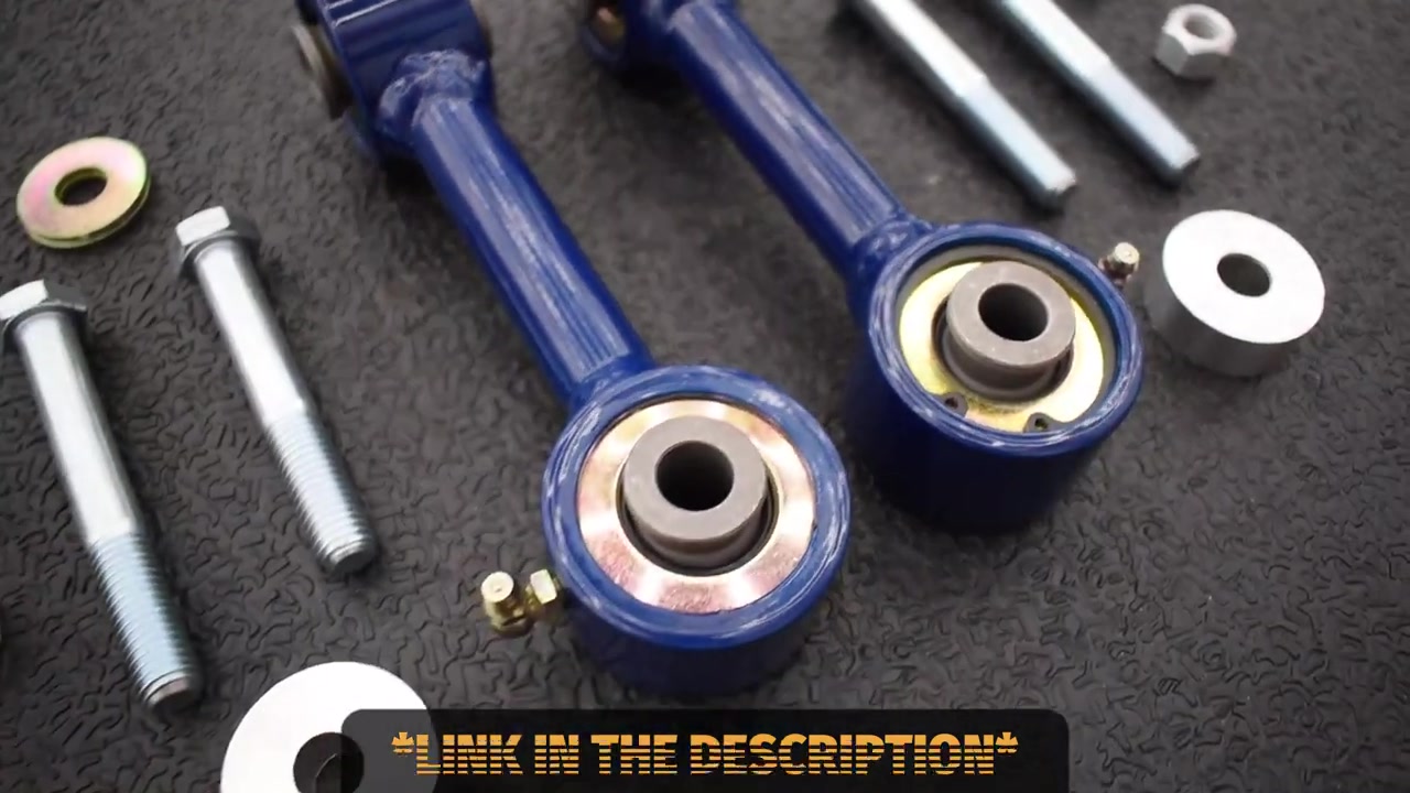 Core 4x4 heavy duty anodized blue front sway bar end links with Johnny Joints and grade 10 hardware laid out on a table