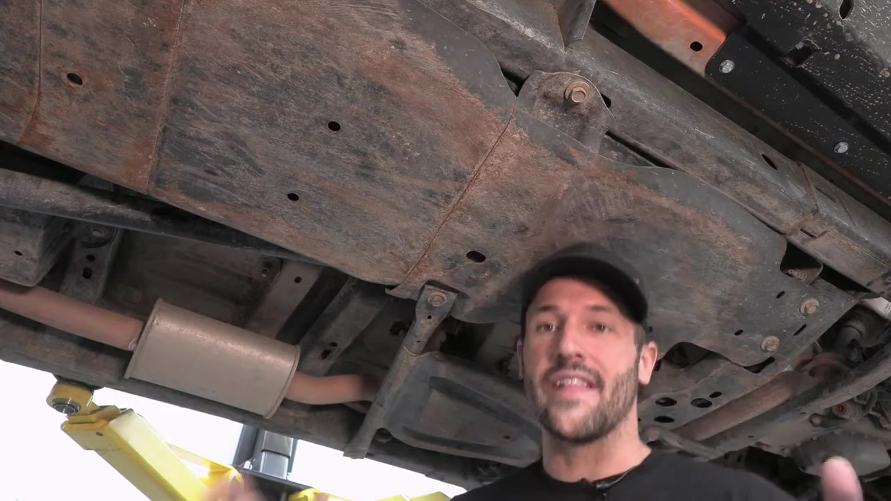 View of JK Wrangler frame and undercarriage with gas tank area exposed