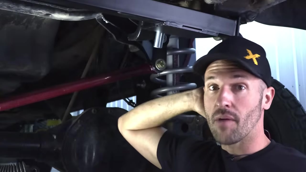 Spence explaining the steering box brace installation under the Ram 3500