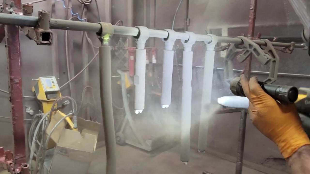 Powder coating Bronco suspension components in the Core 4x4 paint booth