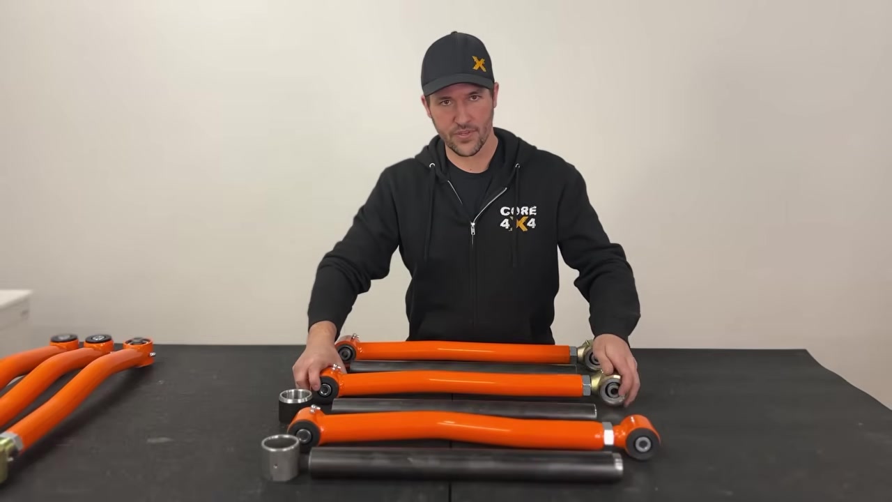 Close-up of the Trail Series control arm showing polyurethane bushing on one end and Johnny Joint on the other