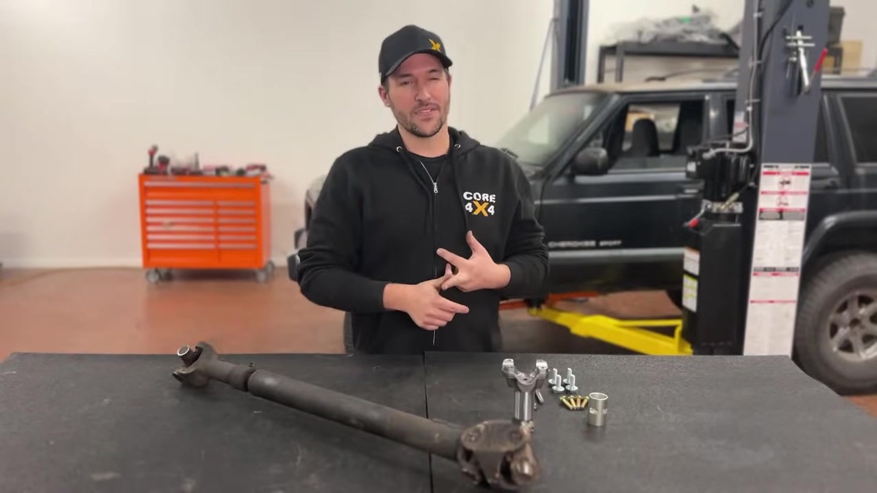 Iron Rock Offroad hack and tap kit laid out on the workbench with drill guide, yoke, bolt, and drill bits