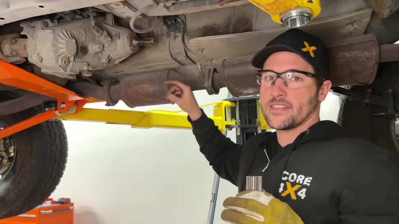 Using the Iron Rock Offroad drill guide to drill straight into the center of the cut transfer case output shaft