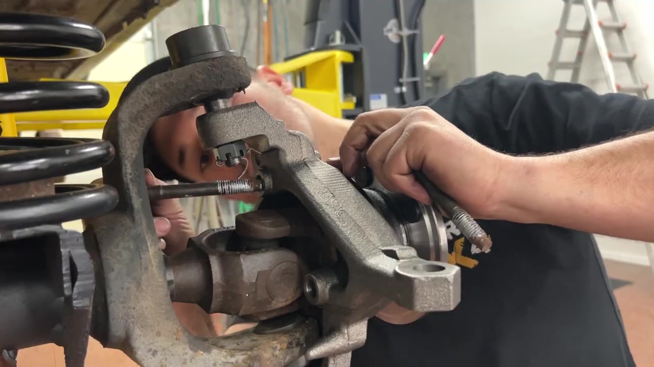 WJ brake caliper and rotor installed on XJ Cherokee after knuckle swap