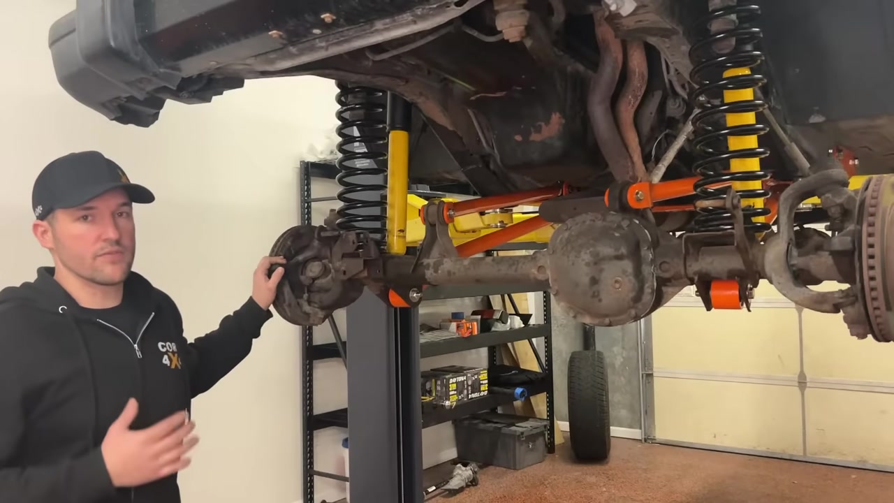 Spence showing the XJ Cherokee Dana 30 front axle with steering and track bar already removed