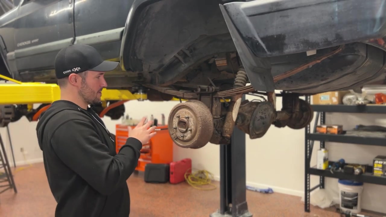 Repositioning brake hard lines into distribution block on XJ Cherokee rear end