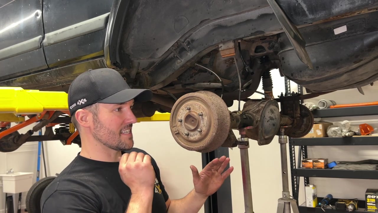Using welding wire to fish new shock bolt through XJ Cherokee subframe
