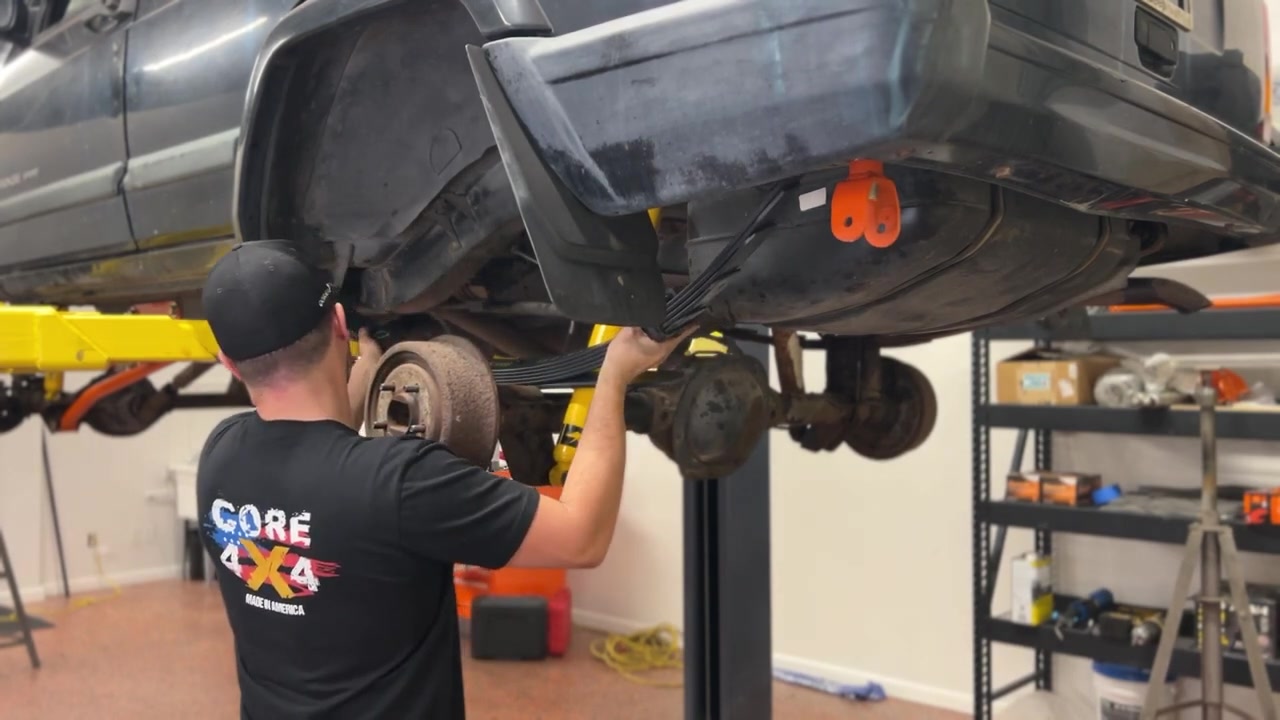 New Core 4x4 leaf spring and adjustable shackle installed on XJ Cherokee rear end
