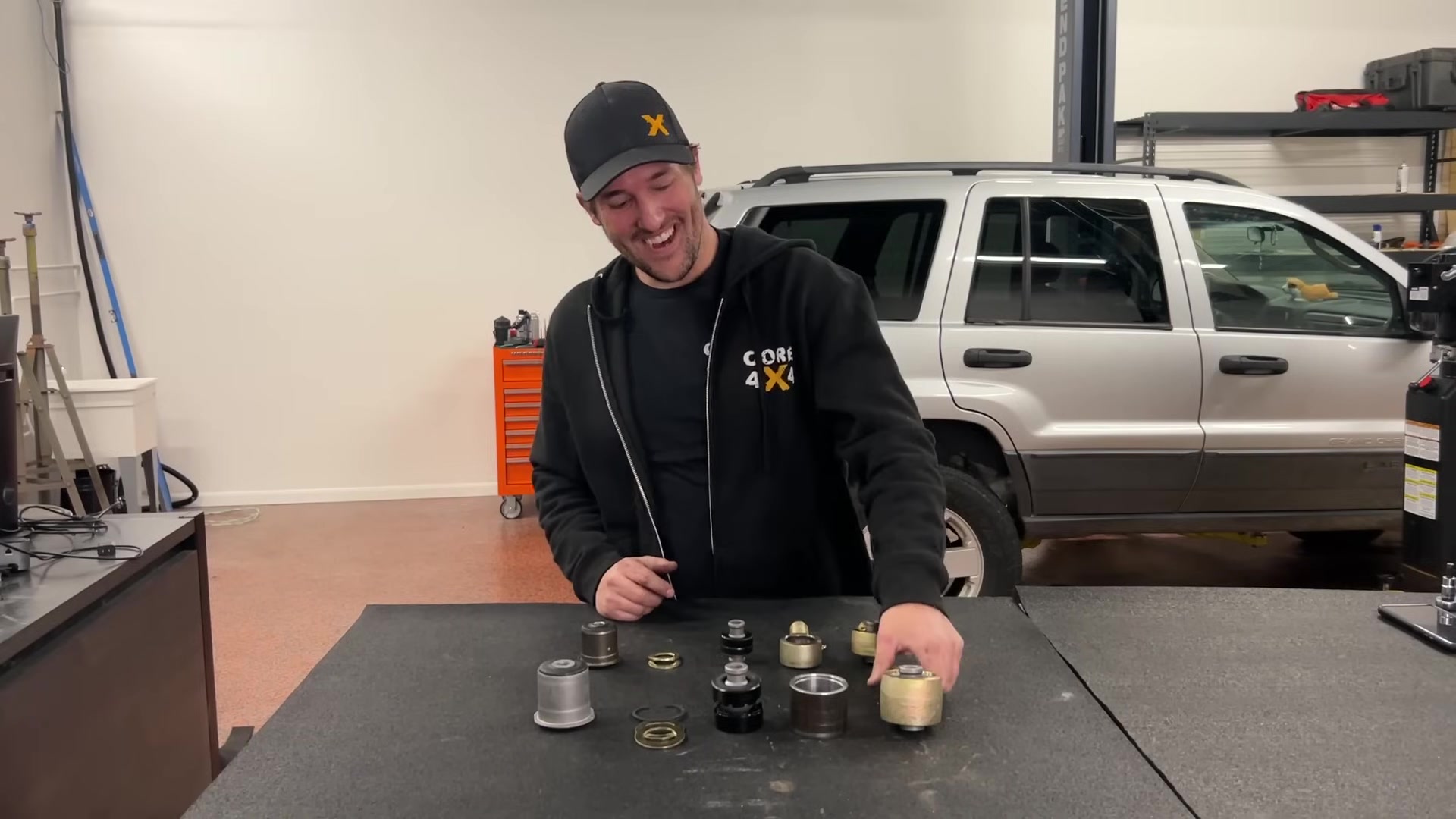 Spence explaining Johnny Joint greasing requirements at the Core 4x4 shop