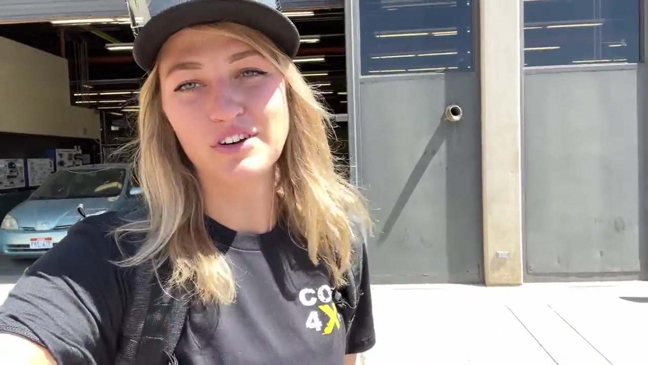 Core 4x4 host wrapping up the JL Wrangler alignment video outside the shop