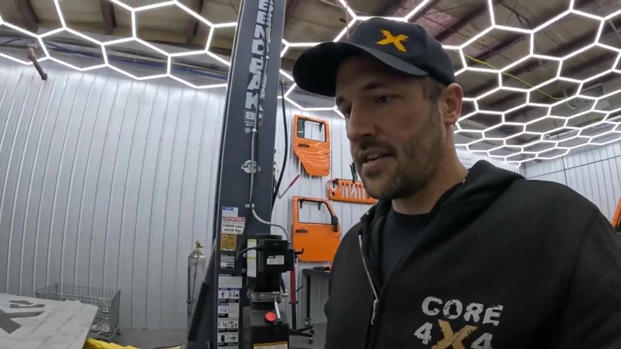 Spence in the Core 4x4 shop discussing tabletop prep and the epoxy fill plan for the laser-cut logo