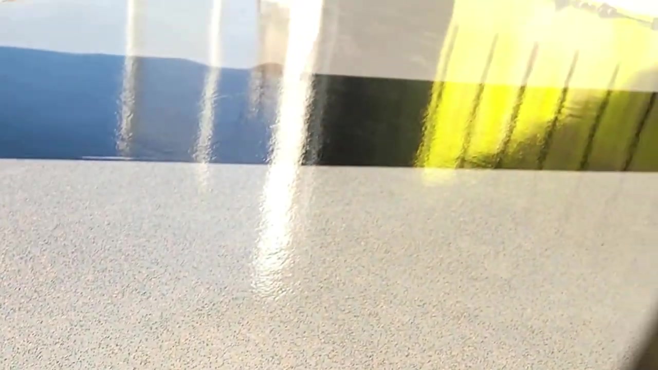 Finished Core 4x4 YouTube studio with epoxy floors and industrial wall panels